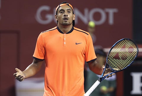 In this Saturday, Oct. 8, 2016, file photo, Australia's Nick Kyrgios reacts after getting a point against Gael Monfils of France during the semifinal match of Japan Open. | AP
