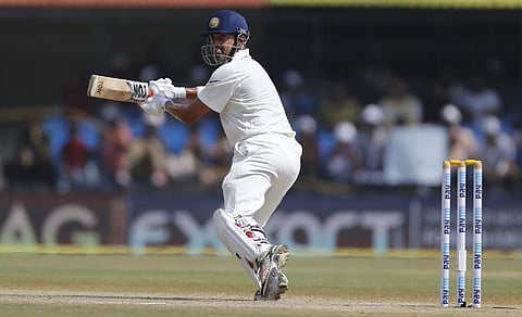 Gautam Gambhir looks for the ball after taking a shot. (Photo | AP)