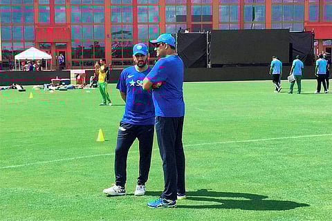 Captain Mahendra Singh Dhoni and coach Anil Kumble have a brief chat ahead of team's training session at Fort Lauderdale in Florida. | PTI