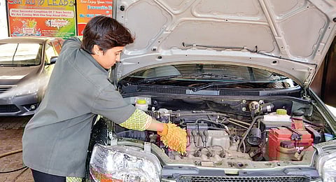 Padmaja Patil (above) says her work experience in two other vehicle showrooms has helped her run her own business and train her employees | d hemanth