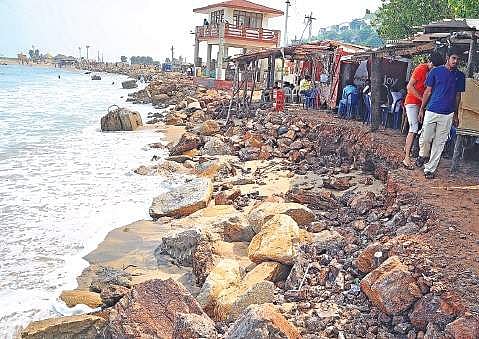 Severe coast erosion cutting down the land space near the local shops affecting the business at Rushikonda Beach  in Visakhapatnam |  RVK Rao