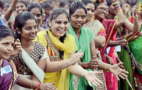 Women participating in the ‘mega Bathukamma’ festivities organised by the government of Telangana at Lal Bahadur Shastri stadium in Hyderabad on Saturday | r satish babu