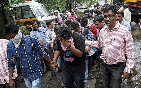 File picture of call centre staffers who were recently arrested in Thane for cheating alleged loan defaulters in the United States
