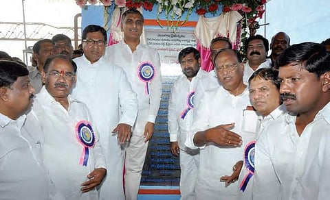Minister T Harish Rao inaugurating the canal on Wednesday | express photo
