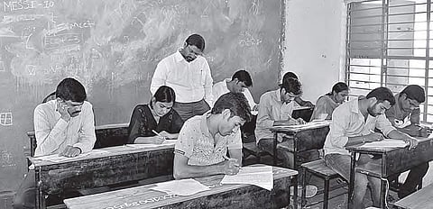 District collector Buddha Prakash Jyothi inspects a Group-II examination centre in Adilabad on Friday | Express photo