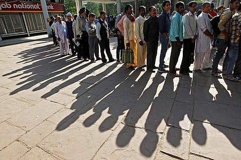 People queued for hours outside banks for a third day to swap 500 and 1,000 rupee bank notes. (Photo | Reuters)