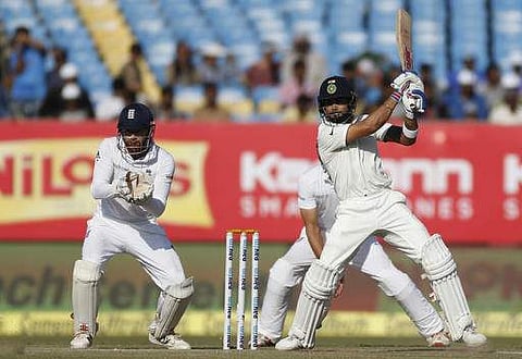 Indian cricket captain Virat Kohli bats on the fifth day of their first cricket test match between India and England in Rajkot,(Photo | AP)