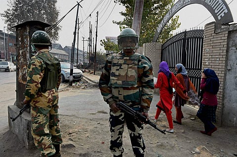 Army personnel standing guard outside a school in Kashmir | PTI