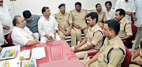 Police talking to Mudragada Padmanabham in his house at Kirlampudi in East Godavari on Tuesday | Express photo