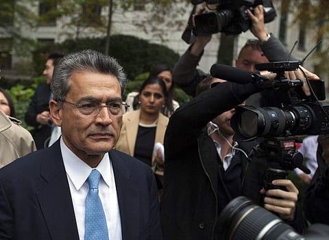 Former Goldman Sachs Group Inc board member Rajat Gupta departs Manhattan Federal Court after being sentenced in New York, October 24, 2012. | Reuters