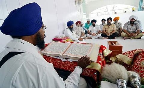 Sikh devotees praying in a Indian Gurudwara in June 2014. (Photo for representation | ENS)