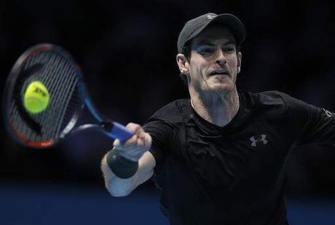 Andy Murray of Britain returns during their ATP World Tour Finals singles final tennis match at the O2 Arena in London.(Photo | AP)