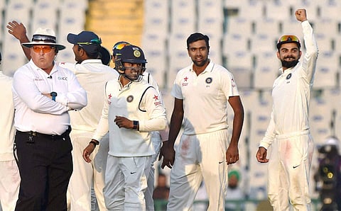 Indian captain Virat Kohli celebrates LBW decision against England's Ben Stokes during the 3rd day of 3rd India-England test match in Mohali on Monday. | PTI