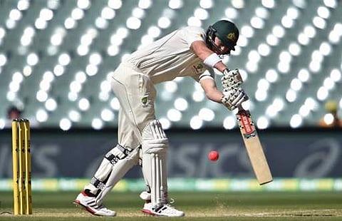 Australia's batsman Matt Renshaw hits a shot against South Africa on the fourth day of the third Test cricket match between Australia and South Africa at the Adelaide Oval in Adelaide. | AFP