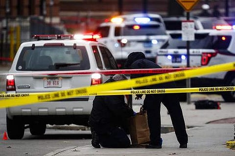 Crime scene investigators at the Ohio State University campus. (Photo | AP)