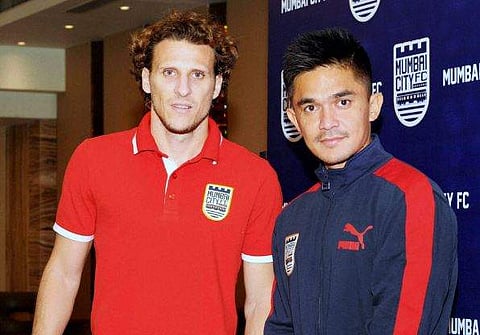 Mumbai City FC players Diego Forlan and Sunil Chhetri addresses the media in Mumbai after Qualifying for the semi-finals for the first time in ISL in Mumbai Tuesday. | PTI