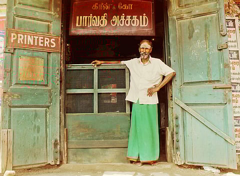 Inside a shop with faded and peeling green coloured walls, sits CN Ravamanickam, the third generation owner of Green & Co Parvathi Press, an 83-year-old printing and binding shop. | Express Photo