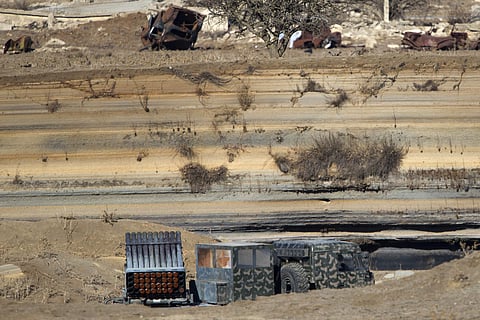 An loaded missile launcher used by an armed group of men, not specified which group of rebels, at Syria's Quneitra border crossing between Syria and the Israeli-controlled Golan Heights. | AP