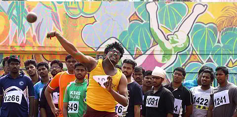 An athlete hurls the shot as other participants watch on during the Kerala University of Health Sciences inter-collegiate athletics meet 2016-17 at the Chandrasekharan Nair Stadium, T’Puram, on Tuesda