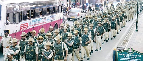 Police take out a flag march ahead of Tipu Jayanti in Mysuru on Tuesday