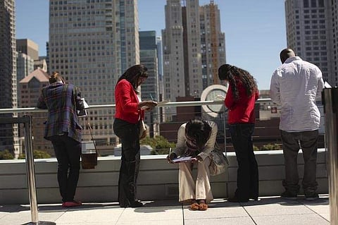 Job seekers apply for the 300 available positions at a new Target retail store in San Francisco, California August 9, 2012. | Reuters