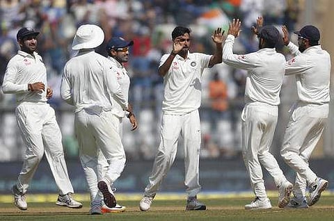 Indian players celebrate the wicket of England's batsman Keaton Jennings on the fourth day of the fourth cricket test match between India and England in Mumbai.(Photo | AP)