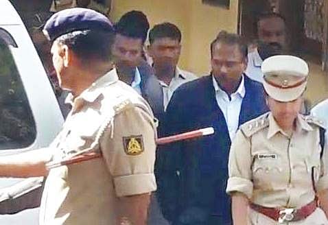 Police taking into custody KAS officer Bheema Nayak from his relative’s house in Kalaburagi on Sunday. Nayak’s personal driver Mohammad was also arrested | Express