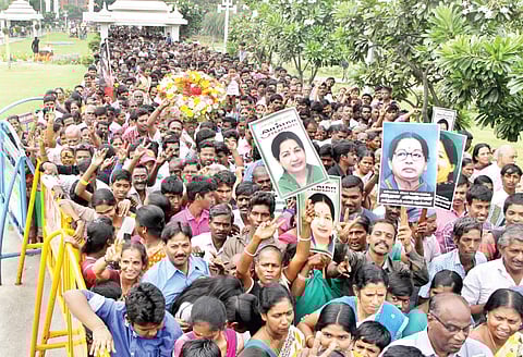 Fans and supporters of J Jayalalithaa swarm MGR memorial to pay tribute to the former chief minister, in the city on Sunday | ashwin prasath