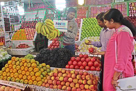 Cashless transaction facility available at a fruit vending shop in Bhubaneswar | Express