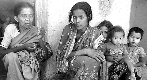 Sarojini Nag with children and mother-in-law in her village| Express