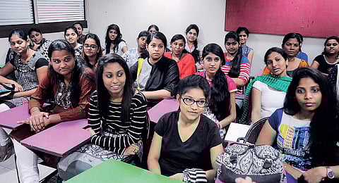 Students of Queen Institute of Fashion during a lecture. The institute was set up in 2003 with 11 students and has now got 100-150 students