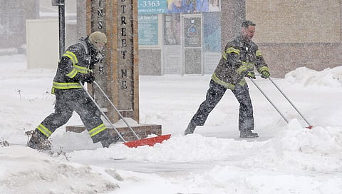 Most of the Dakotas and southwest Minnesota had turned into a slippery mess due to freezing rain Sunday morning before snow arrived later in the day as temperatures fell. | AP