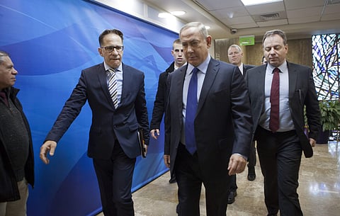 Israeli Prime Minister Benjamin Netanyahu, second right, arrives for a weekly cabinet meeting in Jerusalem, Sunday, Dec. 25, 2016. | AP