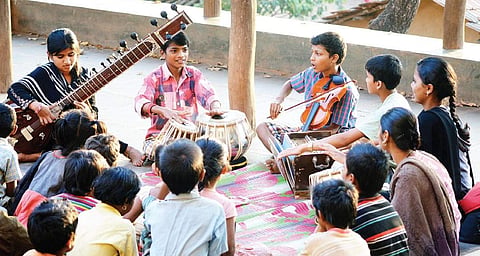 Children attend a music class at the Kalkeri Sangeet Vidyalaya near Dharwad