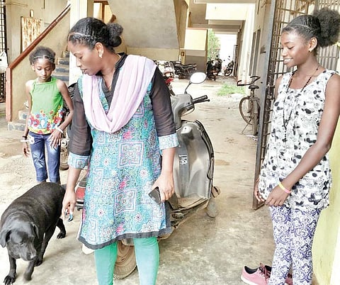 Kamala Babu Siddi, a prominent athlete among the Siddis, with her daughters in Hubballi. | (Srikkanth Dhasarathy | EPS)