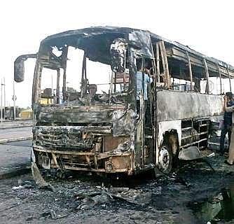 Charred remains of the bus that went up in fire at Dhone in Kurnool district on Sunday | express