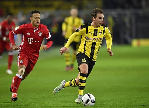 Dortmund has said Goetze (R) should be fit for their Bundesliga clash this weekend against Cologne. | AP