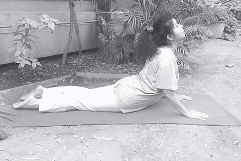 Demonstration of the serpent posture by Anshu Vyas Seetharaman