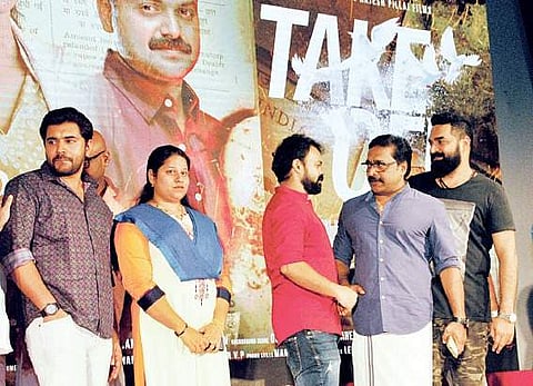 Actors Nivin Pauly, Kunchacko Boban, Renji Panicker and  composer Gopi Sundar with the late director Rajesh Pillai's wife Mekha Pillai at the function to launch the title of Mahesh Narayanan's debut m