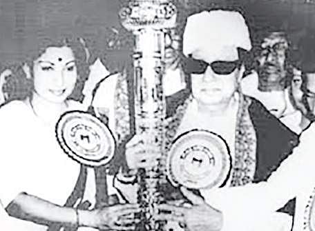 MGR handing over the sceptre to J Jayalalithaa during the AIADMK’s Madurai conference in 1986