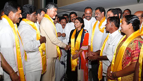 Chandrababu Naidu welcomed the YSRC rebels into his party by adorning them with yellow scarves. | EPS