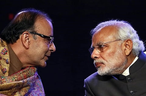 Prime Minister Narendra Modi (R) listens to Finance Minister Arun Jaitley during the Global Business Summit in New Delhi.|Reuters