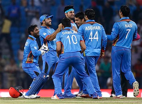 Afghanistan's cricketers celebrate their win over West Indies’ in the ICC World Twenty20 2016 cricket match in Nagpur, India. |AP