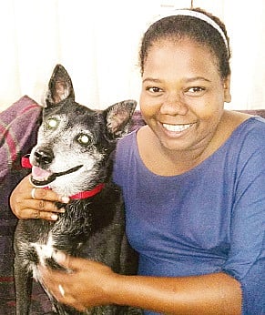 City Woman Stands up for the Love of 43 Dogs