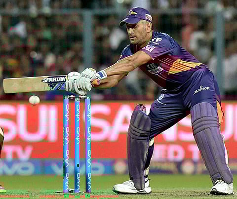 Rising Pune Supergiants Captain M S Dhoni plays a shot during IPL against Kolkata Knight Riders at Eden Garden in Kolkata on Saturday. | PTI