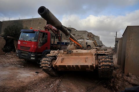 A Libyan armed forces tank during clashes with militants in Libya. 
