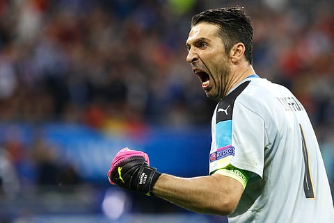 Italy's goalkeeper Gianluigi Buffon celebrates after Emanuele Giaccherini scored during the Euro 2016 Group E soccer match between Belgium and Italy at the Grand Stade in Decines-Charpieu, near Lyon, France, Monday, June 13, 2016. | AP