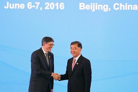 U.S. Treasury Secretary Jack Lew shakes hands with China's Vice Premier Wang Yang before the Economic Dialogue of the 8th round of U.S.-China Strategic and Economic Dialogues in Beijing June 6, 2016. | Reuters