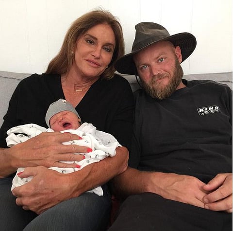 Caitlyn Jenner and son Burt Jenner with new the born grand child Bodhi. | Instagram/@caitlynjenner