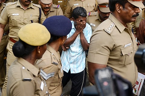 Swathi murder case accused Ram Kumar, being brought to Metropolitan Magistrate Cour in Chennai on Wednesday. (EPS | R Satish Babu)